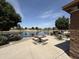 Outdoor picnic and chess area next to the pond offers a relaxing space for social gatherings and activities at 5420 S Mariposa Dr, Gilbert, AZ 85298