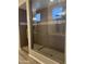 Updated gray tiled shower featuring mosaic tile and rain shower fixture at 5420 S Mariposa Dr, Gilbert, AZ 85298