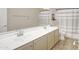 Bright bathroom featuring dual sinks, tile floor and a separate toilet room at 5451 W Folley St, Chandler, AZ 85226