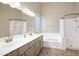 Neutral bathroom with dual sinks and tile floors at 5451 W Folley St, Chandler, AZ 85226