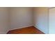 Bedroom features light colored walls, wood floors and a door to the right at 5451 W Folley St, Chandler, AZ 85226
