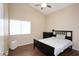 This bedroom boasts hardwood floor, a window, and neutral paint at 5451 W Folley St, Chandler, AZ 85226