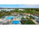 Aerial view of community pool with water slides, lap pool, diving pool, and ample lounge seating at 5451 W Folley St, Chandler, AZ 85226