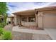 The front porch boasts a desert landscaped yard leading to the house's front entry and garage at 5451 W Folley St, Chandler, AZ 85226