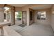 The front porch of the house features large posts and windows, with a view to the landscaped yard at 5451 W Folley St, Chandler, AZ 85226