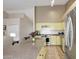 Bright eat-in kitchen features granite counters, stainless appliances, and tile floors at 5451 W Folley St, Chandler, AZ 85226