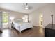 Spacious main bedroom boasts vaulted ceiling, and en-suite bathroom at 5451 W Folley St, Chandler, AZ 85226