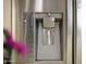 Close-up of a modern refrigerator with a built-in water and ice dispenser, offering convenience and style at 5451 W Folley St, Chandler, AZ 85226