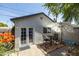 Cozy patio with a small outdoor dining set and accent plants at 546 W Cambridge Ave, Phoenix, AZ 85003