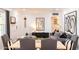 Open-concept living and dining area showcasing contemporary furnishings and natural light at 546 W Cambridge Ave, Phoenix, AZ 85003