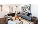 Comfortable living room with a gray sofa, contemporary art, and stylish decor creating an inviting space at 546 W Cambridge Ave, Phoenix, AZ 85003