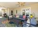 Covered patio with outdoor seating, ceiling fan, and direct access to the house at 546 W Cambridge Ave, Phoenix, AZ 85003