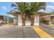 Charming single-story home with mature palm trees providing shade and character at 5601 W Missouri Ave # 254, Glendale, AZ 85301