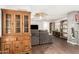 Cozy living room features wood floors, built-in shelving, and neutral paint at 5601 W Missouri Ave # 254, Glendale, AZ 85301