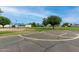 Play some basketball at this park with basketball court, swings, green space, and mature trees at 5601 W Missouri Ave # 254, Glendale, AZ 85301