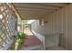 Covered patio with tiled floor and views of the surrounding yard at 5601 W Missouri Ave # 254, Glendale, AZ 85301