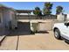 Exterior view featuring a fenced yard and partial view of a vehicle, adding convenience at 6935 W Zoe Ella Way, Peoria, AZ 85382