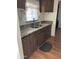 A detailed shot of the kitchen sink and countertop, showcasing its features and functionality at 6935 W Zoe Ella Way, Peoria, AZ 85382