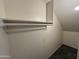 Functional closet featuring a shelf and rod, offering ample storage space with carpet flooring at 7126 N 19Th Ave # 108, Phoenix, AZ 85021
