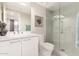 Bright bathroom featuring a glass enclosed shower and a modern vanity with a vessel sink at 7222 E Gainey Ranch Rd # 140, Scottsdale, AZ 85258