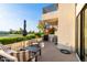 Inviting outdoor patio space with comfortable seating and scenic views of the golf course at 7222 E Gainey Ranch Rd # 140, Scottsdale, AZ 85258