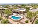 Stunning aerial view of a desert oasis with a private pool, patio, and thoughtfully landscaped grounds at 8255 E Yearling Rd, Scottsdale, AZ 85255
