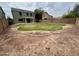 Expansive backyard featuring a spacious lawn, perfect for outdoor activities and relaxation at 8514 S 49Th Dr, Laveen, AZ 85339