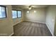 Bedroom filled with natural light, featuring neutral carpeting and multiple windows with mountain views at 8514 S 49Th Dr, Laveen, AZ 85339