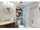 Cozy bathroom with an updated vanity and shower area providing functionality with storage options at 930 N Mesa Dr # 1045, Mesa, AZ 85201