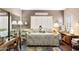 Cozy bedroom featuring a floral patterned daybed, complemented by decorative pillows and stylish accents at 930 N Mesa Dr # 1045, Mesa, AZ 85201