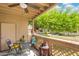 Outdoor patio space with seating and views of the community at 930 N Mesa Dr # 1045, Mesa, AZ 85201