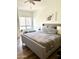 Cozy bedroom with stylish decor, plush bedding, and ample natural light at 9600 N 96Th St # 267, Scottsdale, AZ 85259