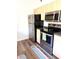 Well-equipped kitchen features stainless steel appliances and neutral cabinetry at 9600 N 96Th St # 267, Scottsdale, AZ 85259