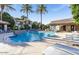 Sparkling community pool with lounge chairs and lush landscaping, perfect for relaxation at 9600 N 96Th St # 267, Scottsdale, AZ 85259