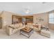 Inviting living room with built in shelving and comfortable seating at 9702 E Naranja Ave, Mesa, AZ 85209