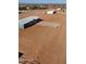 New, modern home with fresh exterior paint in an open lot with a 'For Sale' sign at 10150 E Shallow Canyon Rd, San Tan Valley, AZ 85143