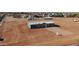 New, modern home with fresh exterior paint in an open lot with a 'For Sale' sign at 10150 E Shallow Canyon Rd, San Tan Valley, AZ 85143