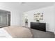 Bright main bedroom with modern decor, neutral color palette, and carpeted floors at 10150 E Shallow Canyon Rd, San Tan Valley, AZ 85143