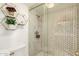 Updated bathroom showcasing stylish shower with white marble and gold accented tile at 10301 N 70Th St # 223, Paradise Valley, AZ 85253