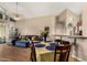 Stylish dining area with a well-lit table and comfortable seating, ideal for Gathering gatherings at 10301 N 70Th St # 223, Paradise Valley, AZ 85253