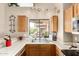 Bright kitchen featuring a stainless steel sink, natural light, and efficient layout for cooking at 10301 N 70Th St # 223, Paradise Valley, AZ 85253