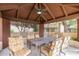 Outdoor pavilion features dining table with seating and overhead fan for relaxing entertaining at 10301 N 70Th St # 223, Paradise Valley, AZ 85253
