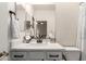 Bathroom with modern fixtures, single sink, and a shower/tub combination at 10545 E Texas Ave, Mesa, AZ 85212