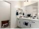 Bathroom with modern cabinets and fixtures, complemented by neutral tones and a separate toilet area at 10545 E Texas Ave, Mesa, AZ 85212