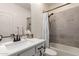 Bathroom featuring a shower/tub, single sink, and modern fixtures at 10545 E Texas Ave, Mesa, AZ 85212