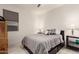 Bedroom with a comfortable bed, neutral colors, and natural light at 10545 E Texas Ave, Mesa, AZ 85212