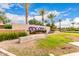 Attractive community entrance sign with manicured landscaping, showcasing the vibrant community at 10545 E Texas Ave, Mesa, AZ 85212