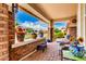 Charming front porch with decorative brick accents and plenty of room for seating at 10545 E Texas Ave, Mesa, AZ 85212