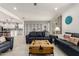 Spacious living room with tile floors, and an open floor plan with great flow to the kitchen at 10545 E Texas Ave, Mesa, AZ 85212
