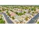 Wide aerial view showcases home's location and many other homes in this community at 10760 W Encanto Blvd, Avondale, AZ 85392